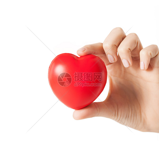 健康医学慈善理念用小红心贴近女的手图片