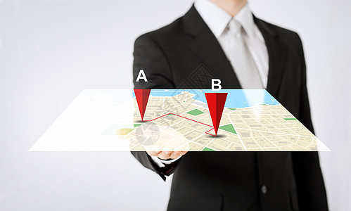 人,商业,导航,技术位置近距离的人手GPS导航仪投影图片