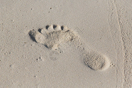 脚步旅行,冒险,暑假海滩人类沙滩上的足迹背景