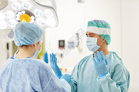 外科,医学人的护士协助外科医生帮助手套手术室医院图片