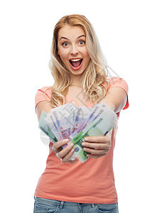 金钱,财政,投资,储蓄人的快乐的轻妇女与欧元现金货币图片