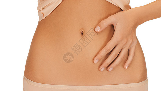 健康,消化减肥的密切妇女的手她的肚子上图片