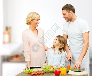 素食,烹饪,幸福人们的快乐的家庭烹饪蔬菜沙拉晚餐交谈家庭厨房背景图片