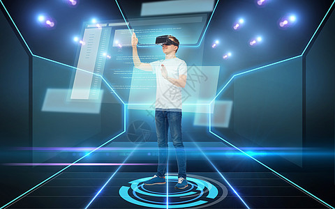 三维技术,虚拟现实,网络,编程人的快乐的轻人虚拟现实耳机3D眼镜与编码屏幕上的黑暗背景激光光背景图片