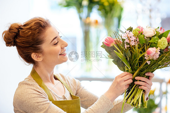 人,商业,销售花卉快乐微笑的花店妇女花店图片