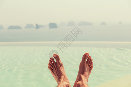 暑假,海滩,旅游,休闲身体护理的特写男的脚海上天空图片