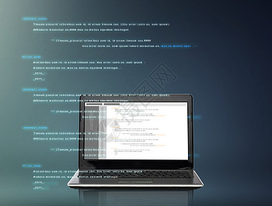 技术编程笔记本电脑与编码屏幕上的灰色背景屏幕上编码的笔记本电脑背景图片