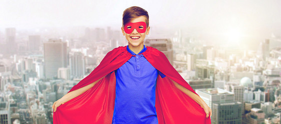 嘉华,童,权力,手势人的快乐男孩红色超级英雄斗篷具城市背景图片