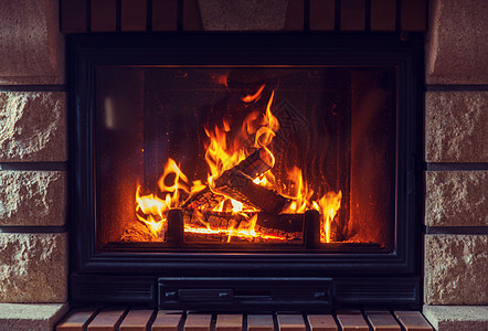 加热,温暖,火舒适的燃烧的壁炉家里图片