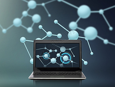 技术,网络,科学互联网笔记本电脑的分子结构屏幕上的灰色背景图片
