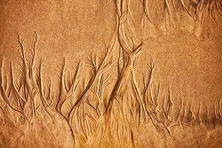 湿海砂的质地与水的图案图片