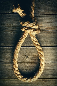 绳套,旧的木制背景上结图片
