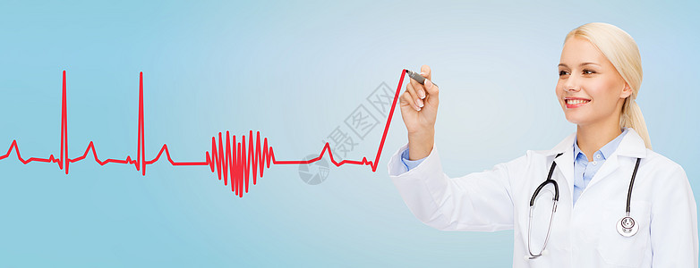 医疗保健,医疗技术轻的女医生蓝色背景下空气中绘制心跳心电图图片
