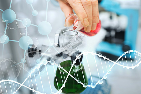 科学化学生物学医学人的密切科学家的手填充试管,并临床实验室进行DNA分子结构的研究图片