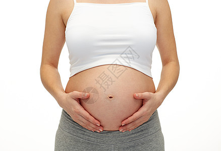 怀孕,母亲,人期望密切孕妇触摸她裸露的肚子图片