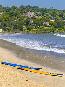 热带沙滩冲浪板,吉姆巴兰,巴厘岛,印度尼西亚图片