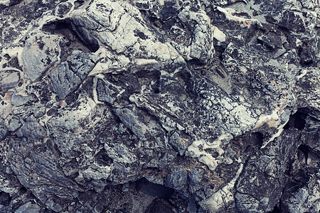 灰色火山岩的纹理紧密图片