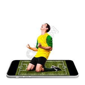 足球足球运动员正现代手机屏幕上庆祝图片