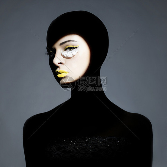 超现实主义肖像的轻女士与艺术化妆图片