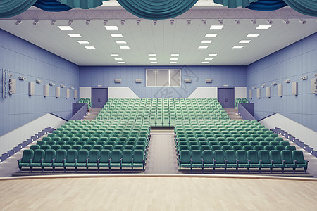 现代剧院大厅的空绿色扶手椅图片