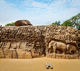 恒河Arjunarsquo的祖先古代石雕印度泰米尔纳德邦Mahabalipuram的纪念碑背景图片