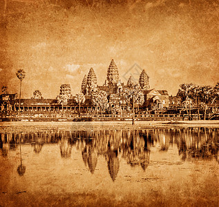 复古效果过滤了时尚风格风化色调的旅游形象柬埔寨地标吴哥窟与反射水中图片