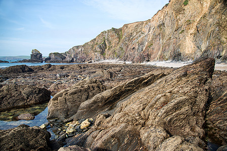 日落景观海景的岩石海岸线希望湾英国图片