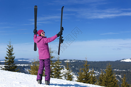 冬季妇女滑雪运动乐趣旅游雪图片