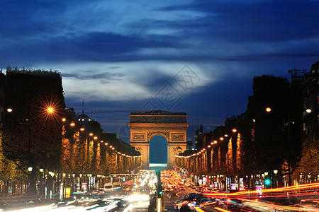 美丽的夜景与汽车交通匆忙埃夫宁的凯旋门,巴黎,法国图片