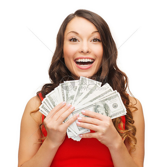 微笑的女人穿着红色的衣服,带着美元的钱图片
