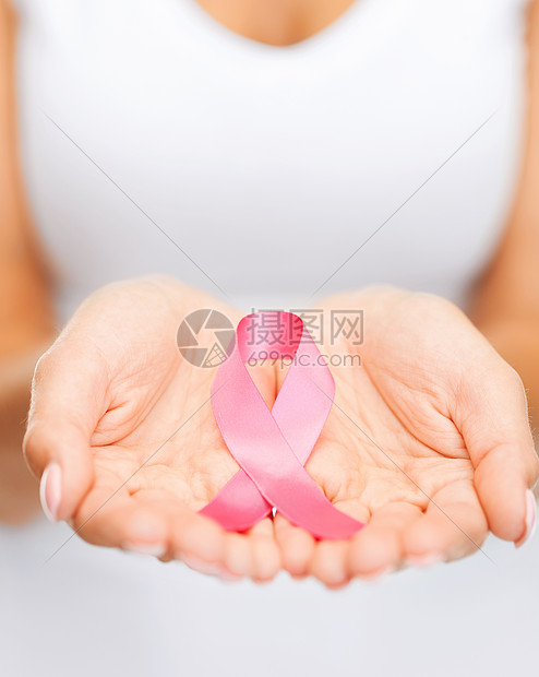 医疗保健医学妇女手粉红色乳腺癌意识丝带图片