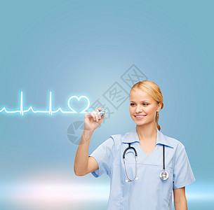 医疗保健,医疗技术轻的医生护士绘制心电图图片
