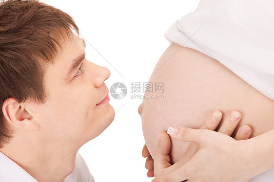 男部孕妇腹部的明亮特写照片图片