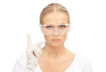 戴防护眼镜手套的女人的明亮照片图片