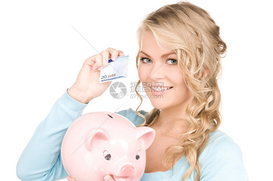 可爱的女人带着储蓄罐钱的照片图片