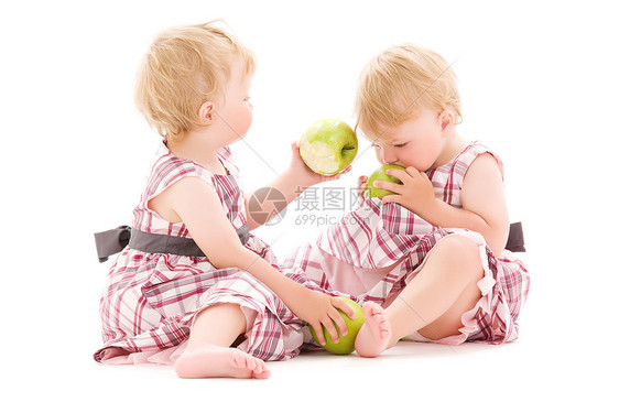 两个可爱的双胞胎穿白色的照片图片