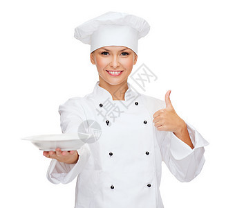 烹饪食物微笑的女厨师,厨师包师与空盘子大拇指图片