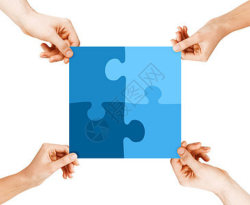 商业,队合作协作四只手连接蓝色拼图图片