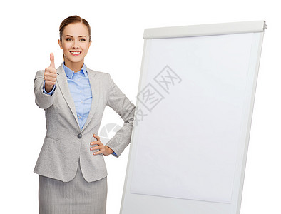 商业,教育办公室微笑的女商人站翻板旁边,竖大拇指图片
