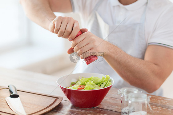 烹饪家庭男手调味沙拉个碗图片
