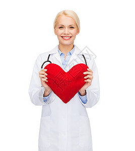 保健医学微笑的女医生与心脏听诊器高清图片