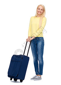 旅行度假的年轻女人带着手提箱图片