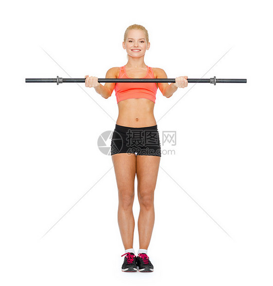 健身,运动节食的微笑的运动女人用杠铃锻炼图片