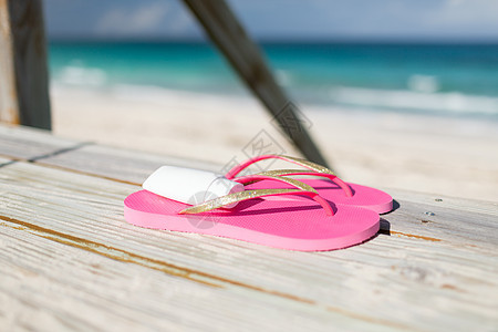 海滩,夏天,假期配件防晒霜拖鞋海边图片