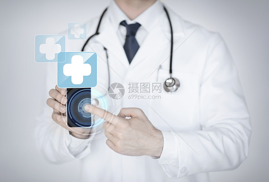 ‘~男医生持智能手机与医疗应用程序  ~’ 的图片