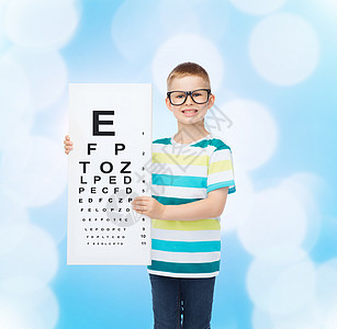 视觉,健康,儿童,眼科人的微笑的小男孩戴着眼镜,带着蓝色背景的眼图图片