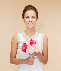 幸福,婚礼,假日庆祝微笑的新娘伴娘穿着白色的裙子,带着花图片