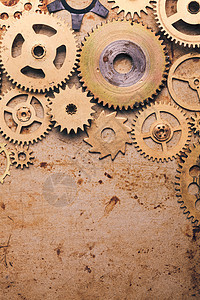 蒸汽朋克背景机械时钟的细节旧的金属背景时钟里,齿轮图片