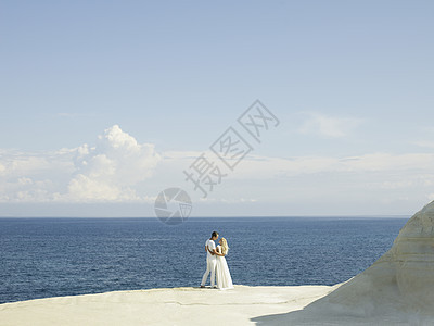 海滨新娘新郎的艺术照片时尚婚礼图片