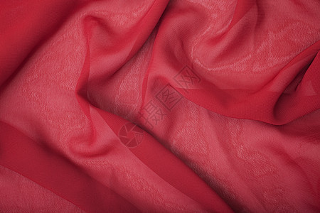 红色缎子丝绸的纹理特写图片